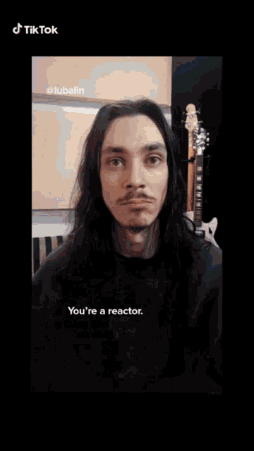 a blurred image of a man with the words you 're a reactor
