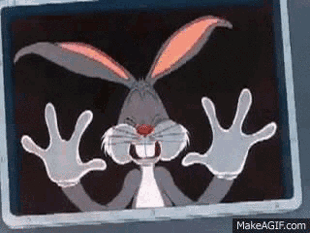 bugs bunny is making a funny face with his hands outstretched in a photo .