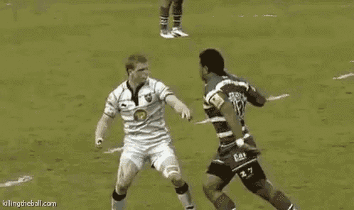 two men are playing rugby on a field and one of them is wearing a number 37 jersey .
