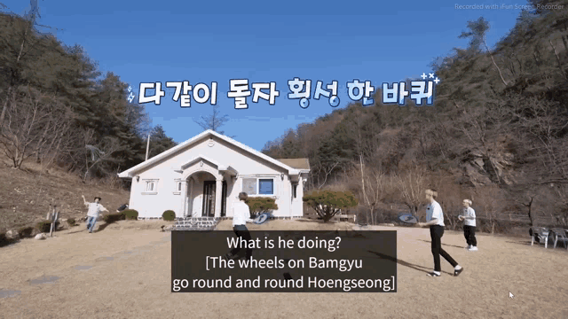 a screenshot of a video that says what is he doing the wheels on bamgyu go round and round hoenseong
