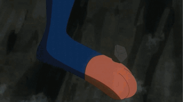 a cartoon character is kicking a fireball with his foot