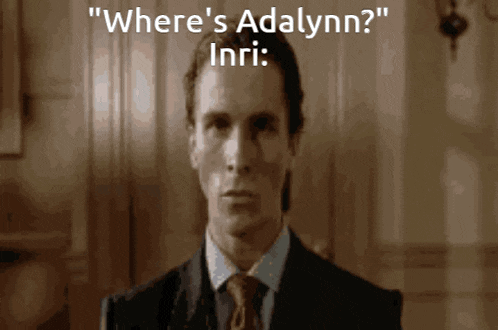 a man in a suit and tie with the words " where 's adalynn inri " above him