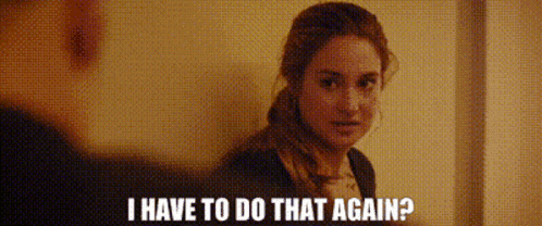 a woman is standing in front of a wall and says `` i have to do that again ? ''