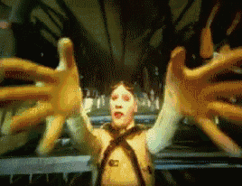 a close up of a person 's hands reaching out towards something