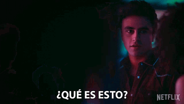 a netflix advertisement shows a man talking to a woman in spanish