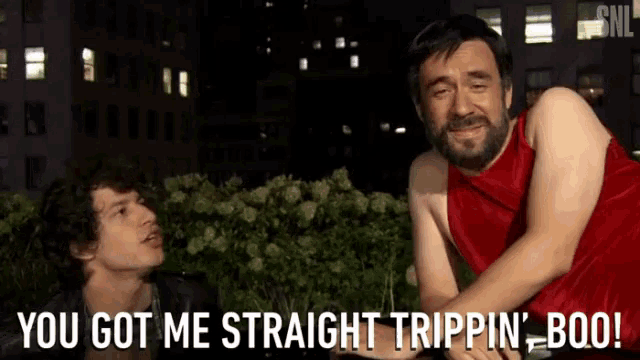 a man in a red shirt says " you got me straight trippin boo "