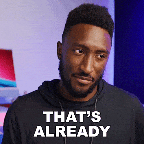 a man with a beard says that 's already in white letters