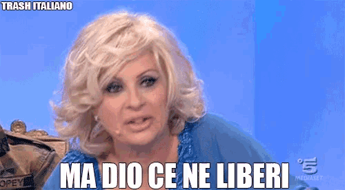 a woman says " ma dio ce ne liberi " on a television screen