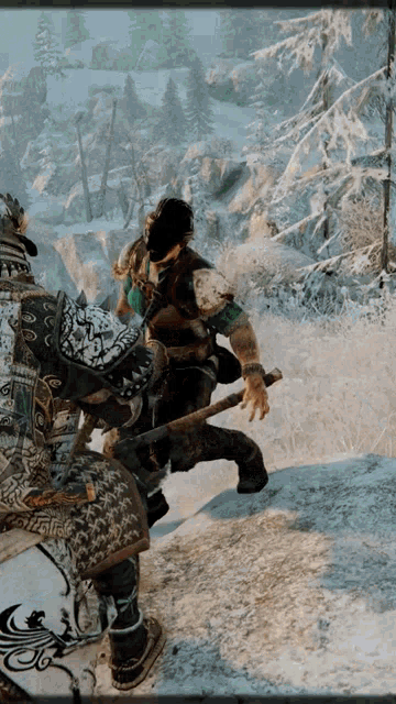 a screenshot of a video game shows two warriors in a snowy area