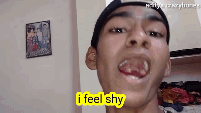 a man says i feel shy in front of a picture