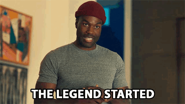 a man in a gray shirt and a red beanie says the legend started