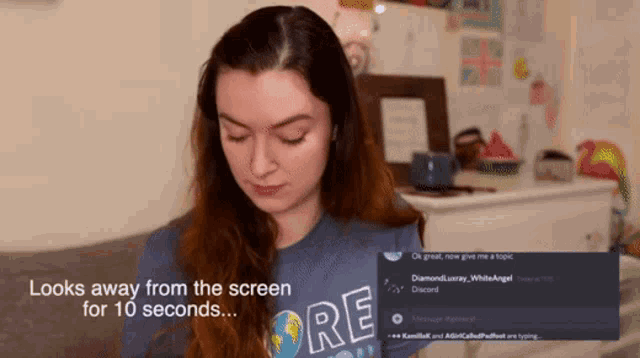 a woman in a blue shirt with the word ore on it looks away from the screen for 10 seconds
