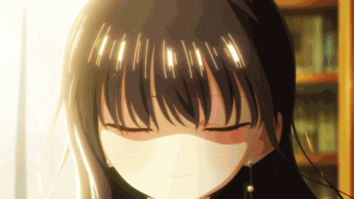 a close up of a girl with her eyes closed and her hair shining