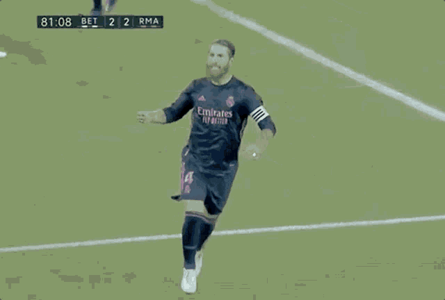 a soccer player wearing a jersey with the number 4 on the back