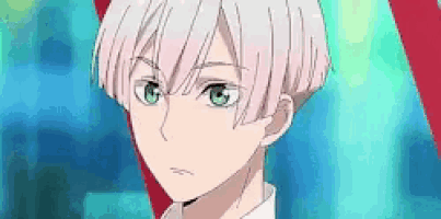 a close up of a anime character with white hair and green eyes .