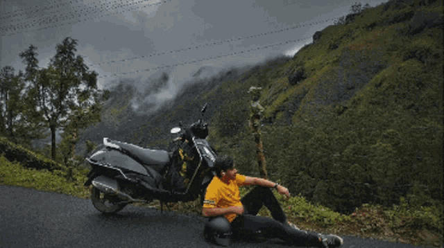 a welcome to ahsan 's vibes poster with a man sitting on the ground next to a motorcycle