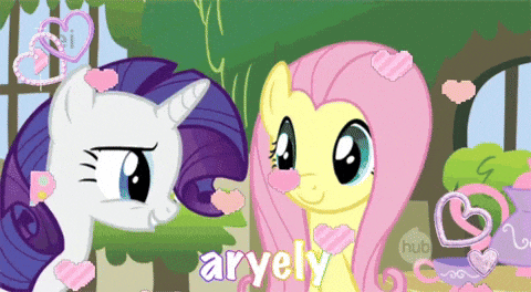 a couple of ponies standing next to each other with the word aryely in the corner