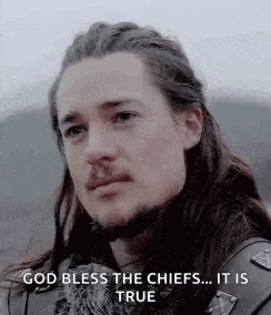 a man with long hair and a beard is saying `` god bless the chiefs ... it is true `` .