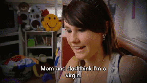 a woman says " mom and dad think i 'm a virgin " in front of a stuffed smiley face