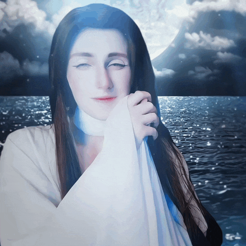 a woman with long hair is standing in front of the ocean with her eyes closed