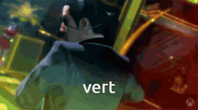 a blurred image of a man with the word vert on the bottom right