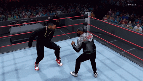 two men are fighting in a wrestling ring in a video game