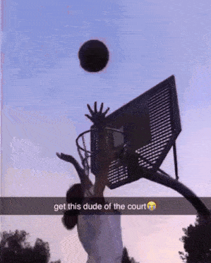 a person playing basketball with the caption " get this dude of the court "