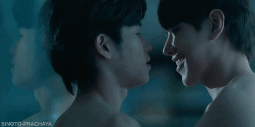 singto-prachaya is written on the bottom right corner of a picture of two men kissing