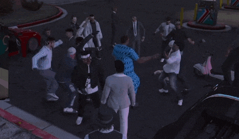 a group of people are standing in a circle on the street