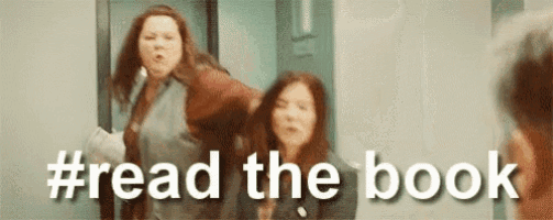 a group of women are standing next to each other in a hallway with the words `` read the book '' written on the bottom .