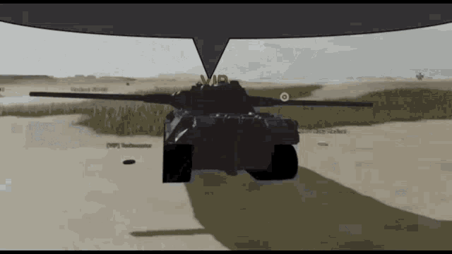 a black tank is driving down a dirt road with a speech bubble above it .