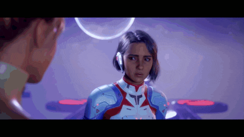 a woman in a futuristic suit talks to another woman in a video game