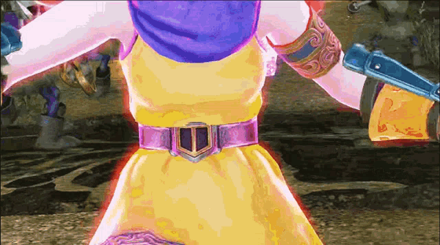 a woman in a yellow dress with a purple belt