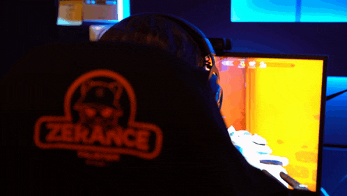 a person wearing headphones and a shirt that says zekance on it
