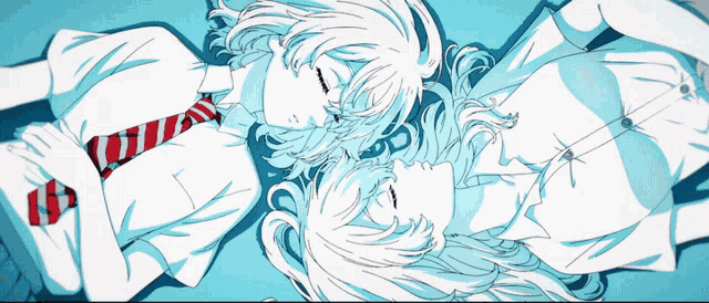 a couple of anime characters laying on the ground