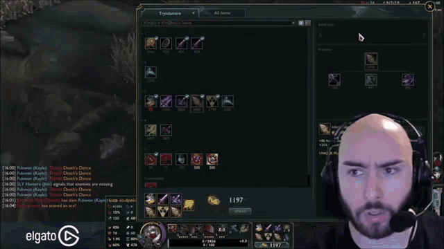 a man wearing headphones is playing a video game on a screen that says elgato on it
