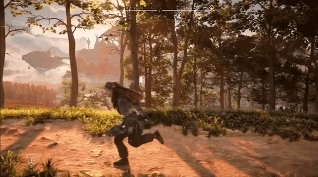 a person in a video game is running through a lush green forest