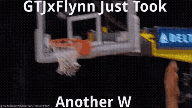 a picture of a basketball hoop with the words gtjxflynn just took another w written on it .