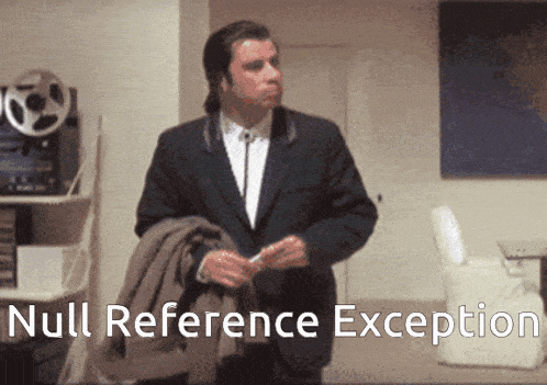 a man in a suit is standing in a room with the words null reference exception behind him