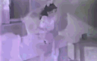 a close up of a person 's face with a purple background