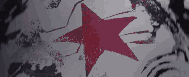 a red star is on a white background