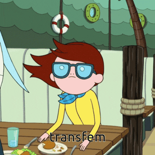 a cartoon character with glasses sits at a table with the word transfem written below him