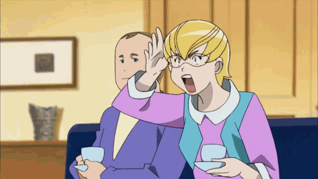 a man and a woman are sitting on a couch and the woman is making a face