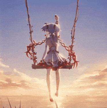 a girl in a white dress is sitting on a swing overlooking a body of water