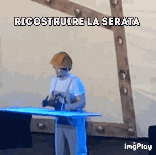 a man wearing a hard hat is standing in front of a table with the words ricostruire la serata written above him