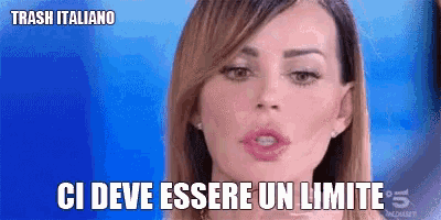 a close up of a woman 's face with the words " ci deve essere un limite " above her
