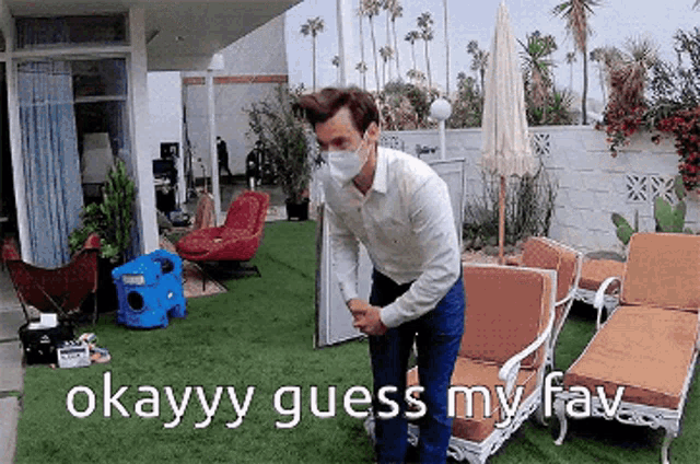 a man wearing a face mask is standing on a patio with chairs and says okayyy guess my fav .