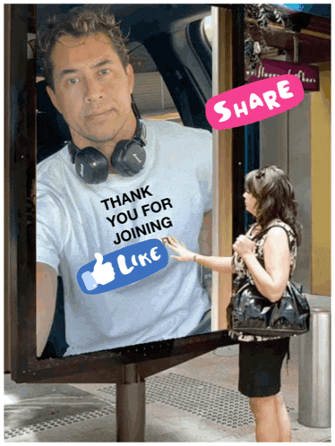 a man wearing a shirt that says " thank you for joining " is being touched by a woman