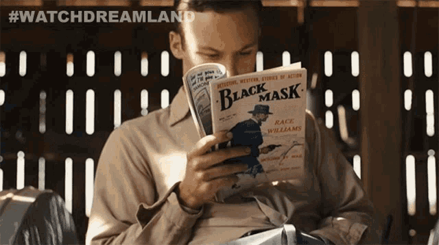 a man is reading a book called black mask by race williams
