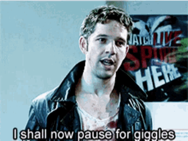 a man says i shall now pause for giggles in front of a poster